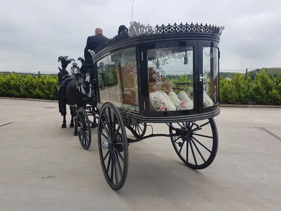 Horse drawn, glass sided hearse